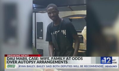 Dau Mabil's family at odds over independent autopsy arrangements