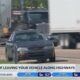 What are the dangers of leaving your vehicle along a highway?