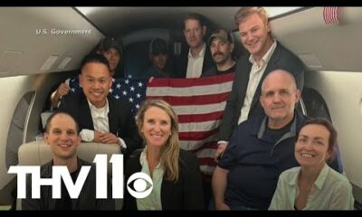 Americans return to United States after prisoner swap