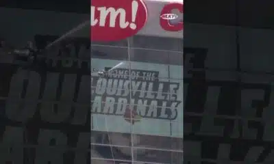 Drone power washes outside of KFC Yum! Center