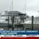 Voluntary evacuations underway at some Coast harbors