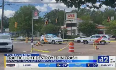 Jackson traffic light damaged in crash