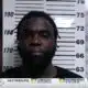 D’Iberville man arrested for allegedly shooting 2 people after argument over tip, being escorted...