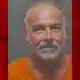 Brad Simpson faces hold for questioning by federal authorities