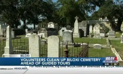 Volunteers clean up Biloxi Cemetery ahead of guided tours
