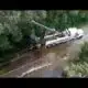 WATCH: Patrol vehicle being pulled from floodwaters