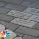 Metro Drug Coalition dedicates 100 bricks near recovery center to those who faced addiction