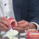 Get dental implants that look real and act like original teeth at Troy Family Dental!
