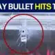 Sleeping girl shot after stray bullet goes through bedroom window
