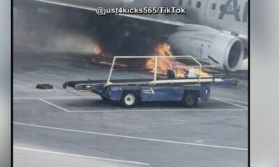 Video shows smoke, flames as American Airlines plane catches fire at Denver airport | NBC4