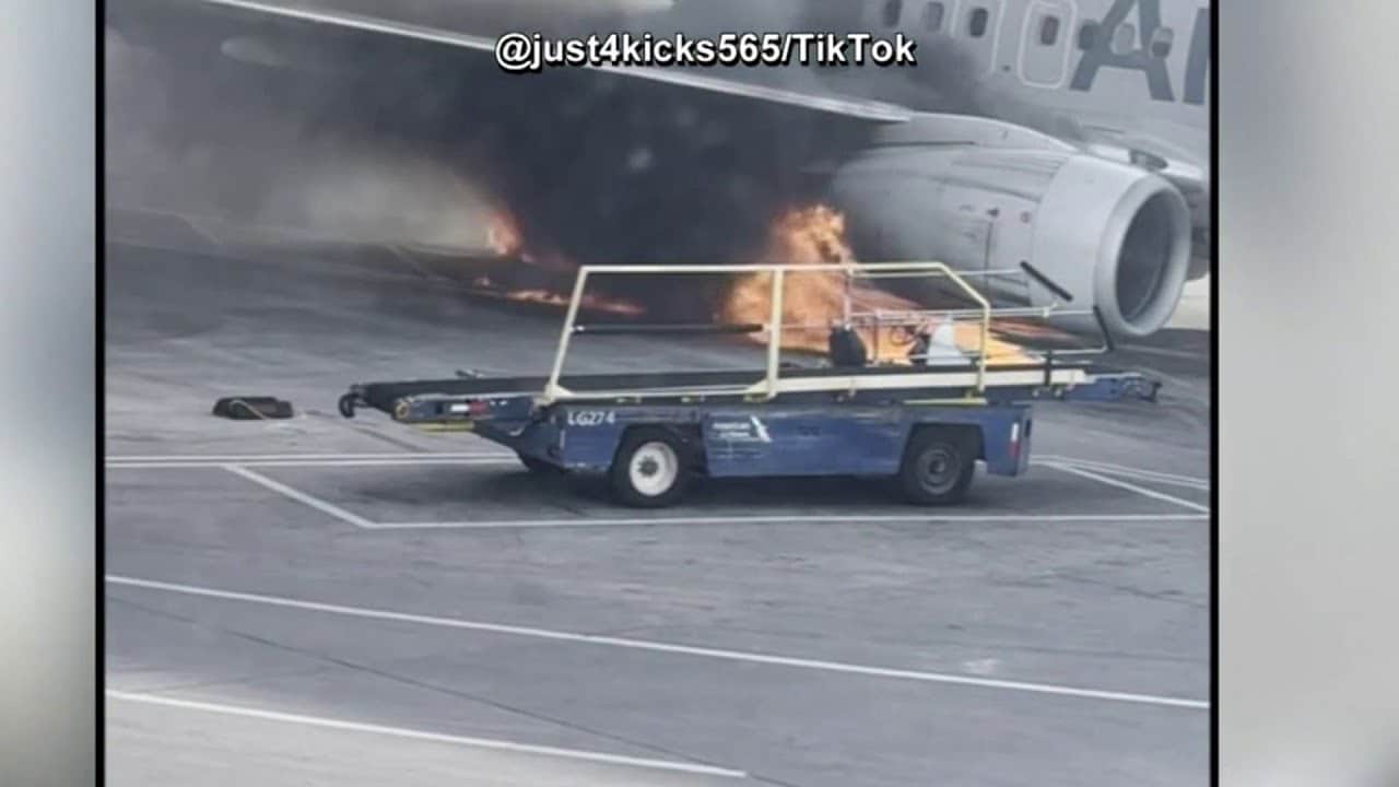 Video shows smoke, flames as American Airlines plane catches fire at Denver airport | NBC4