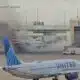 12 hurt after American Airlines plane catches fire at Denver airport