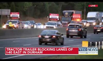 Tractor-trailer overturns on I-40 East in Durham