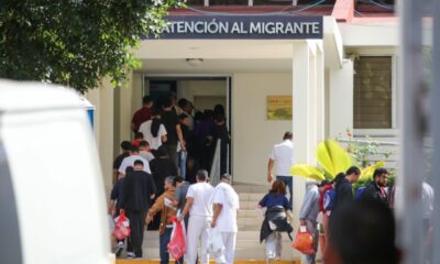 Deported migrants queue to receive an essential items bag during the arrival of a group of deported Salvadorans at Gerencia de Atención al Migrante on Feb. 12, 2025 in San Salvador, El Salvador.  (Photo by Alex Peña/Getty Images)