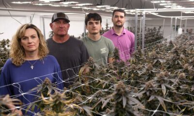 From left to right, Ann Gauger, Keil Gauger, Great Gauger and Zach Gauger stand inside their indoor hemp farm at Caprock Family Farms, Friday, May 23, 2025, in Lubbock.