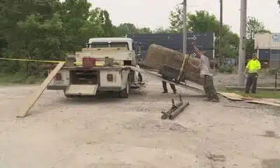 Multiple bodies found in exhumed Salem, Ill., grave 
