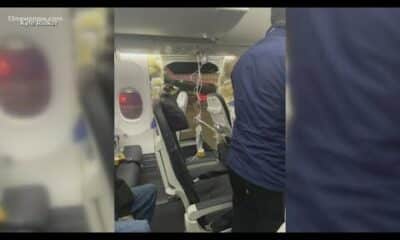Investigators break down door blowing off Boeing 737