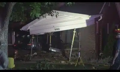 2 injured after SUV plows into University City home