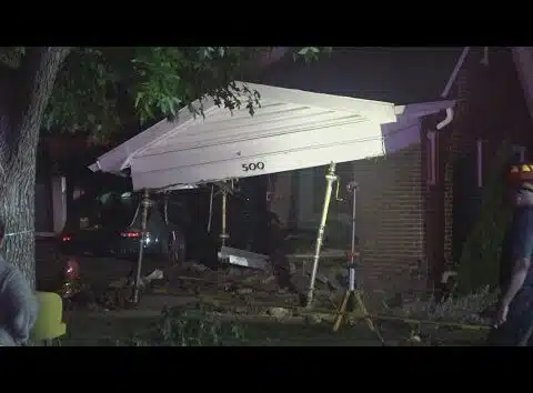 2 injured after SUV plows into University City home