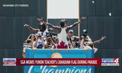 SGA wears Yukon teacher's Canadian flag during parade