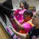 Girls learn construction skills at summer camp