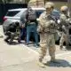 National Guard soldiers deployed this month to Los Angeles guard ICE agents during an immigration enforcement operation.