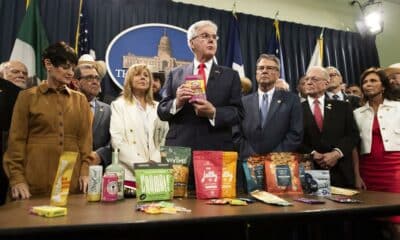 Lt. Gov. Dan Patrick shows off various THC and CBD products during a press conference in the Texas Capitol on May 28, 2025. Patrick, joined by representatives from the House and Senate, spoke about Senate Bill 3 and how its passage would be a service to Texans, saving their lives. The bill is set to head to Gov. Greg Abbott’s desk, which Patrick said he wasn’t worried about.