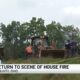 Crews return to scene of house fire