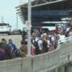 Lines extend outside Lambert Airport terminal as large St. Louis convention group leaves