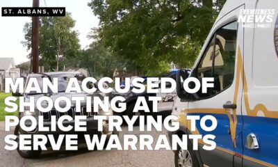 Man accused of shooting at police who were trying to serve warrants in murder investigation