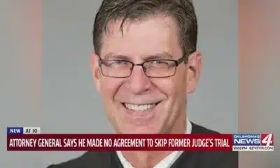 Attorney general says he made no agreement to skip former judge's trial