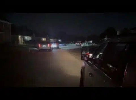 Video shows woman shooting at intruders who broke into home
