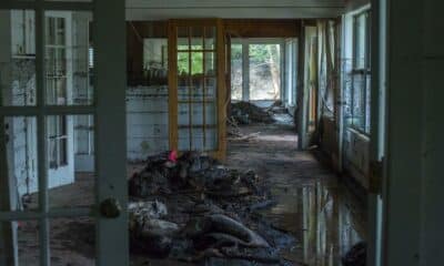 Mud and debris fill the home of James Wright on Wednesday, July 9, 2025, in Hunt, Texas.