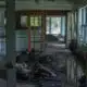 Mud and debris fill the home of James Wright on Wednesday, July 9, 2025, in Hunt, Texas.