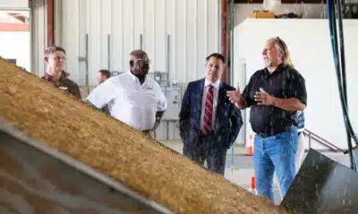 Right to left, Texas A&M Transportation Institute (TTI) research scientist Jett McFalls, gives Texas A&M University System Chancellor Glenn Hegar, TTI agency director Greg Winfree, and deputy agency director Joe Zietsman a tour of the sediment and erosion control laboratory at the Texas A&M RELLIS campus in College Station, Texas, on Tuesday, July 22, 2025. Hegar’s visit to the RELLIS campus was his first since beginning his tenure as chancellor on July 1.
