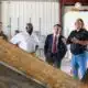 Right to left, Texas A&M Transportation Institute (TTI) research scientist Jett McFalls, gives Texas A&M University System Chancellor Glenn Hegar, TTI agency director Greg Winfree, and deputy agency director Joe Zietsman a tour of the sediment and erosion control laboratory at the Texas A&M RELLIS campus in College Station, Texas, on Tuesday, July 22, 2025. Hegar’s visit to the RELLIS campus was his first since beginning his tenure as chancellor on July 1.