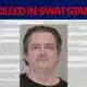 Man killed in SWAT standoff after charging with a knife