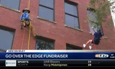 'You’re not alone': Community rappels down Slugger Museum, raises $55K