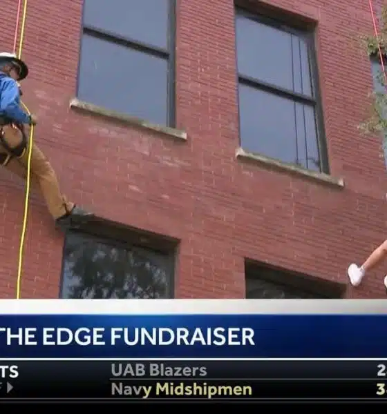 'You’re not alone': Community rappels down Slugger Museum, raises $55K